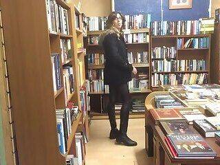 Crossdresser flashing in bookstore - ashemaletube.com